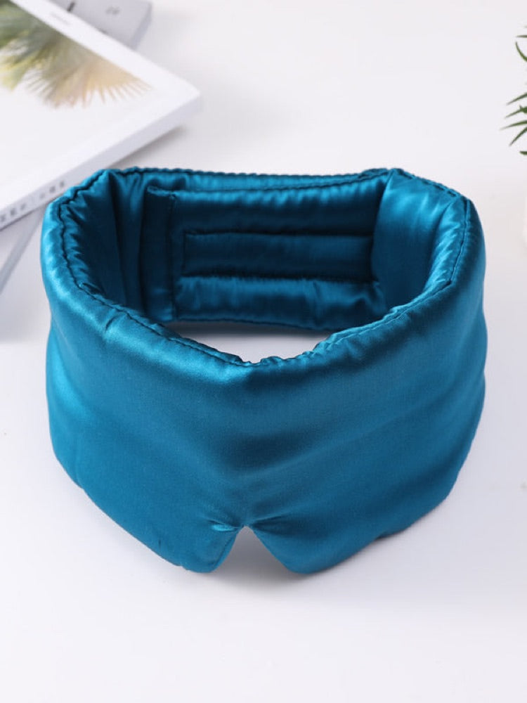 Sea blue SilkRest silk sleep mask laid flat