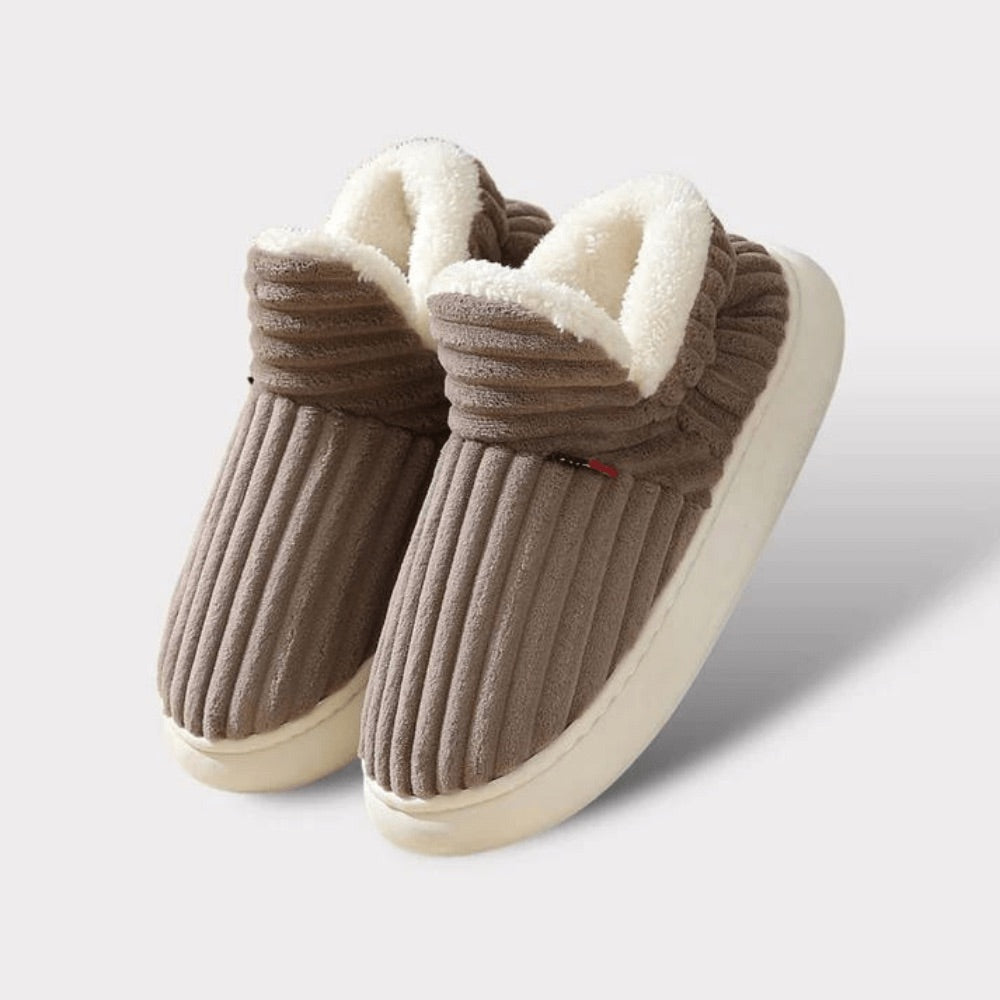 Brown WarmStep winter slippers, side view
