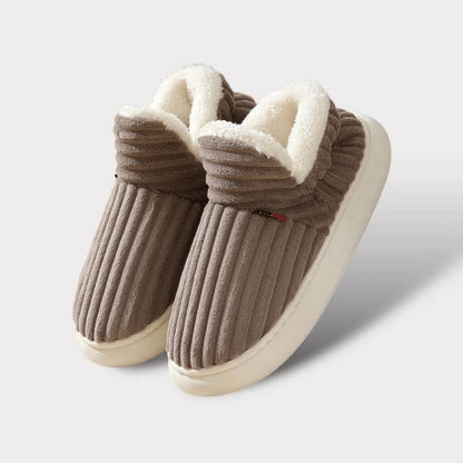 Brown WarmStep winter slippers, side view
