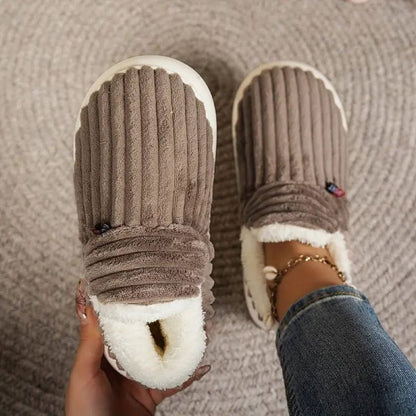 Brown WarmStep winter slippers seen from above